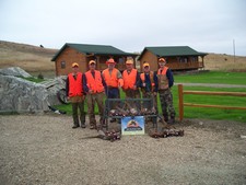 A group of pheasant hunters at the lodge.